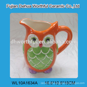 Handmade ceramic water jug with owl design